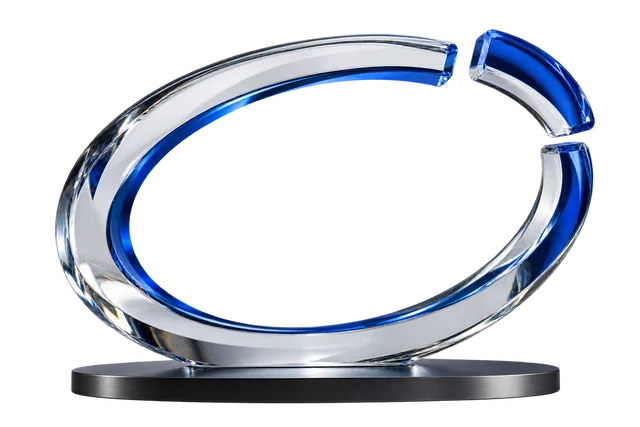 Optical glass loop with a separated cobalt-blue segment on a graphite base.